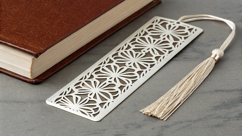 A collection of unique bookmarks with different shapes, foil details, and tassels.