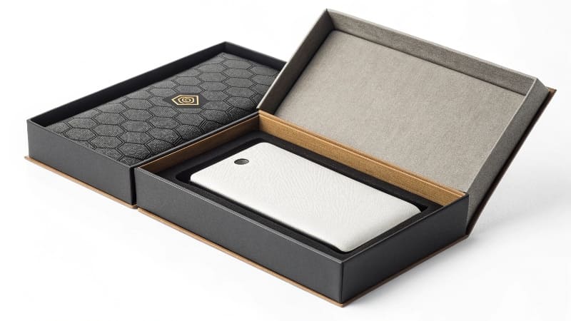 Custom Sleeve Box Unboxing A luxurious black box with a beautifully printed white sleeve sliding off to reveal the product.